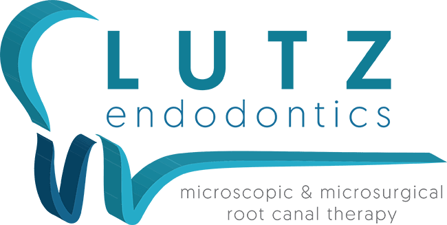 A blue and black logo for the pluton endodontist.