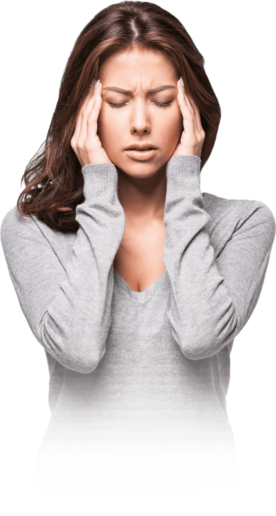 A woman in grey sweater holding her head.